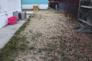 View of yard featuring central AC unit