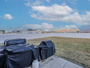 View of yard with a mountain view