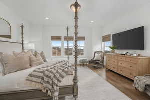 Bedroom featuring dark wood-type flooring