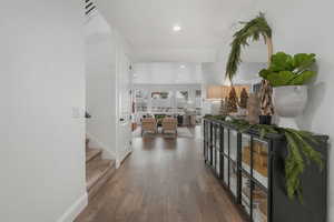 Corridor featuring hardwood / wood-style floors