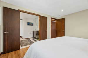 Primary Bedroom featuring light hardwood / wood-style floors