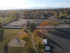 Birds eye view of property with a mountain view