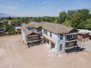 Front of the home featuring 3 car garage