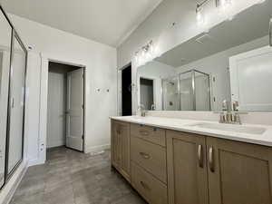 Bathroom with vanity and walk in shower