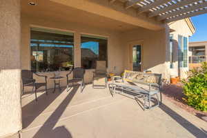 View of patio with a pergola