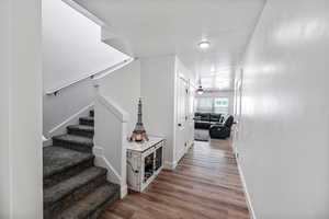 Corridor featuring light hardwood / wood-style flooring