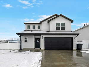 Front of property featuring a garage