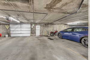 Garage featuring a garage door opener