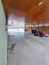 Garage featuring wooden ceiling