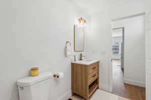 Bathroom with vanity and toilet