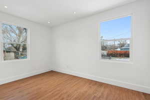 Spare room featuring hardwood / wood-style flooring