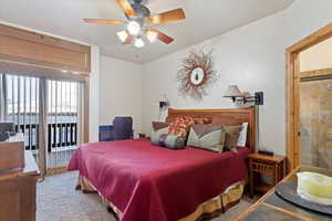 Master Bedroom on Main Level. Carpeted bedroom with ceiling fan