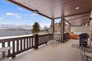 Deck  with gas area for grilling, Lake &  mountain view, and a hot tub