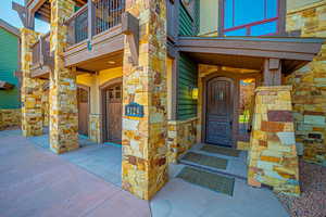 Entrance to property featuring a balcony