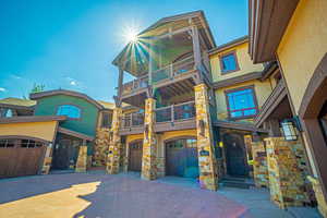 View of front of house with a balcony