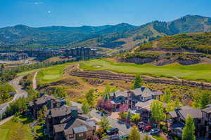 Drone / aerial view featuring a mountain view