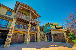 View of front of home featuring a balcony