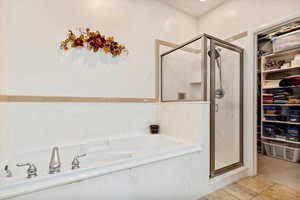 Bathroom with plus walk in shower