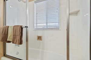 2nd Master Bedroom Bathroom with combined bath / shower with glass door