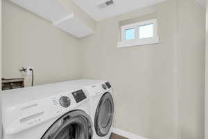 Laundry area with separate washer and dryer