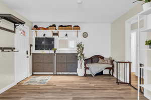 Unfurnished room with light wood-type flooring