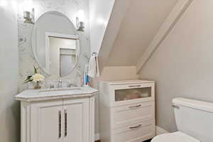 Bathroom with vanity and toilet