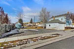 Exterior space featuring a storage shed