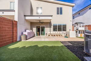 Back of property featuring a patio area and ceiling fan