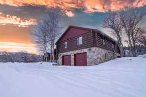 View of snow covered property