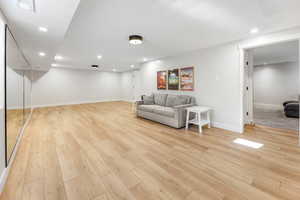 Living room featuring light hardwood / wood-style flooring