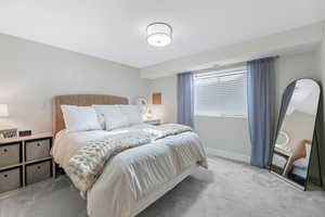 View of carpeted bedroom