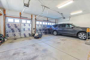 Garage featuring a garage door opener