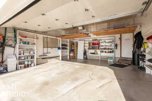 Garage featuring a garage door opener