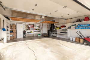 Garage featuring a garage door opener