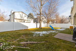 View of yard featuring a playground