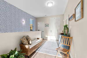 Sitting room with light tile patterned floors