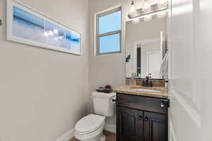 Bathroom with vanity and toilet