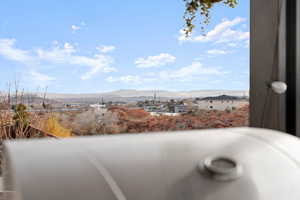 View of water feature with a mountain view