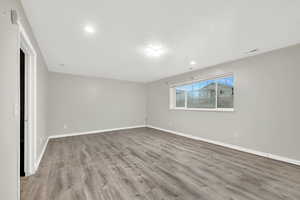 Empty room with light wood-type flooring