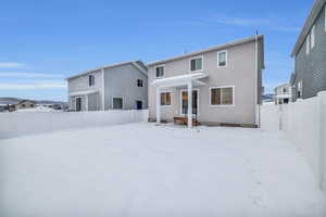 View of snow covered property