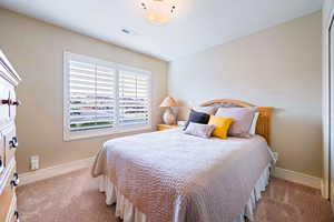 View of carpeted bedroom