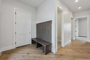 Mudroom featuring light hardwood / wood-style floors