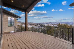 Wooden deck featuring a mountain view