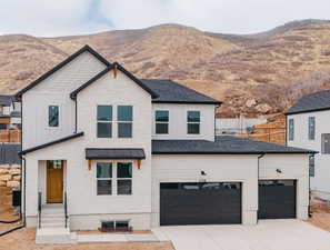 Modern farmhouse featuring a mountain view