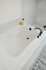 Bathroom with a tub to relax in