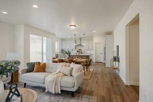 Living room featuring hardwood / wood-style flooring