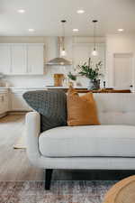 Living room with wood-type flooring