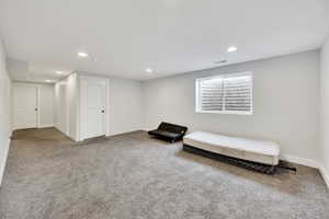 Living area featuring carpet flooring