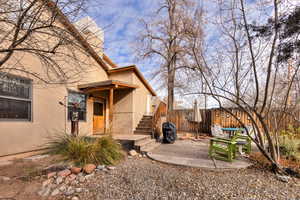 Rear view of property with a patio area