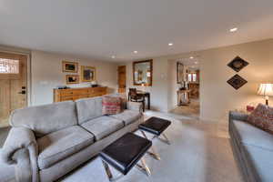 Living room with light colored carpet